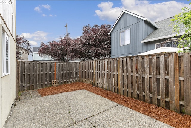18450 SW Longacre St, Beaverton, OR 97003 - fenced backyard with a patio