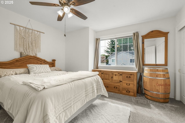 bedroom with light colored carpet and ceiling fan
