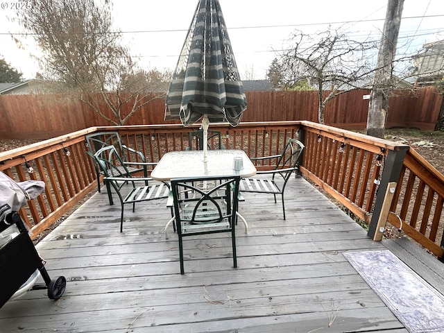 wooden terrace with grilling area