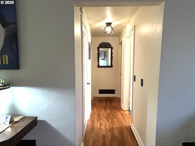 hall featuring wood-type flooring