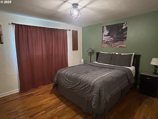 bedroom featuring wood-type flooring