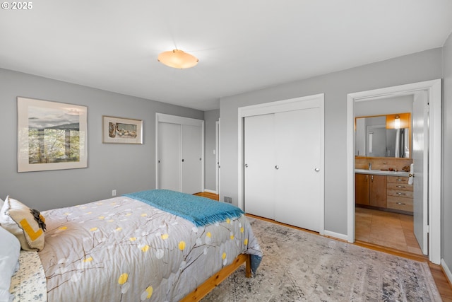bedroom with connected bathroom