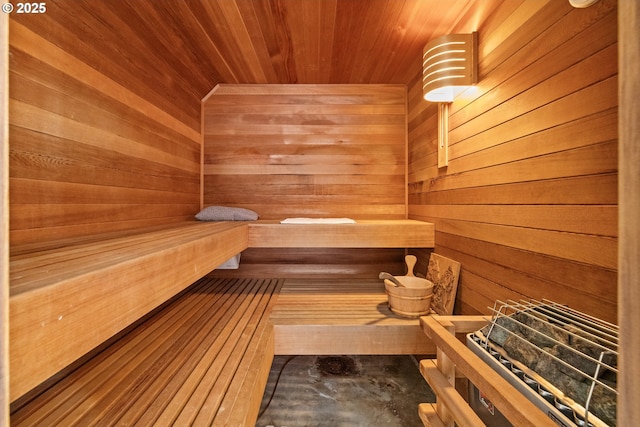relaxing sauna / steam room with wooden walls and wood ceiling
