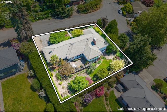 aerial view of property and surrounding area featuring property boundaries highlighted
