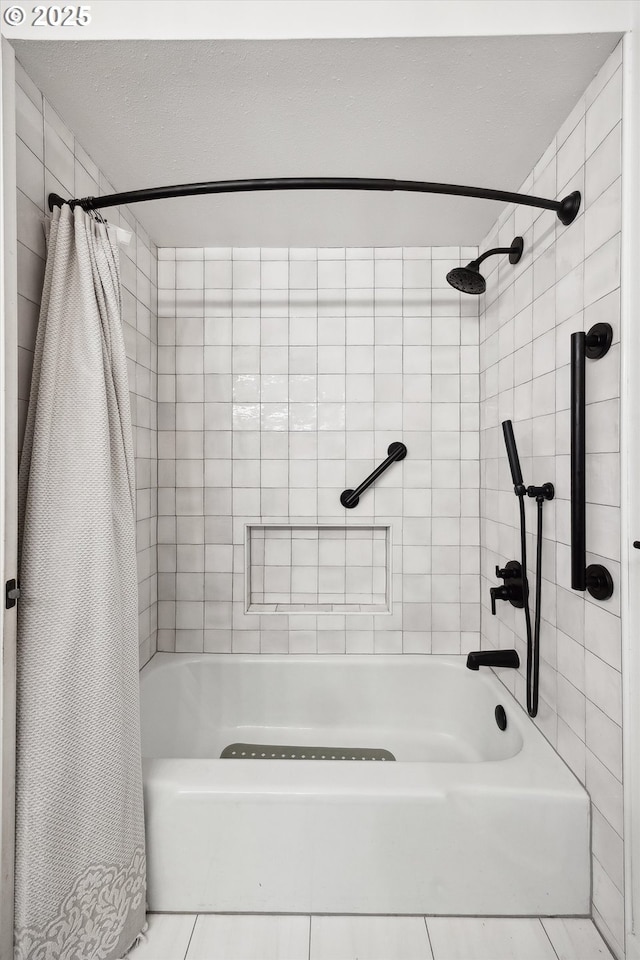 bathroom featuring tile patterned floors and shower / bath combo