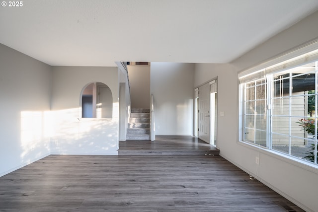 17510 NW Fieldstone Dr, Beaverton, OR 97006 - empty room featuring stairway and wood finished floors