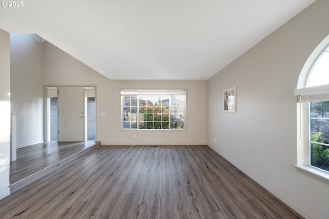 17510 NW Fieldstone Dr, Beaverton, OR 97006 - unfurnished living room with wood finished floors and vaulted ceiling