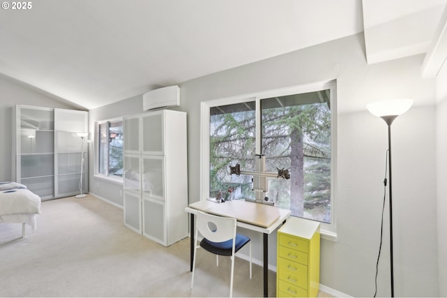 carpeted office with a wall mounted air conditioner and vaulted ceiling