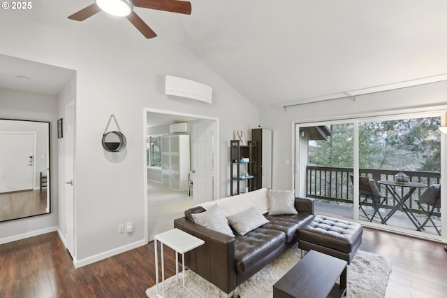 living area with ceiling fan, wood finished floors, high vaulted ceiling, and baseboards