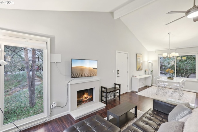 living room featuring beamed ceiling, dark wood-type flooring, ceiling fan with notable chandelier, and high vaulted ceiling