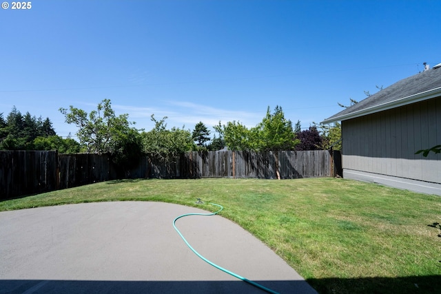 3840 Vista Dr, North Bend, OR 97459 - fenced backyard with a patio area