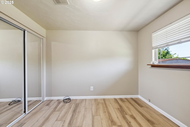 3840 Vista Dr, North Bend, OR 97459 - unfurnished bedroom with wood finished floors and a closet
