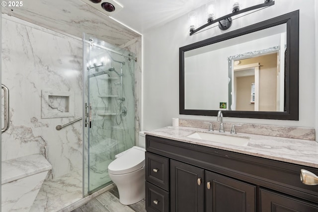 3840 Vista Dr, North Bend, OR 97459 - bathroom featuring vanity, a marble finish shower, and wood finished floors