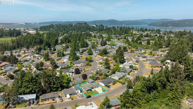3840 Vista Dr, North Bend, OR 97459 - view of property location featuring property boundaries highlighted, a water and mountain view, and nearby suburban area