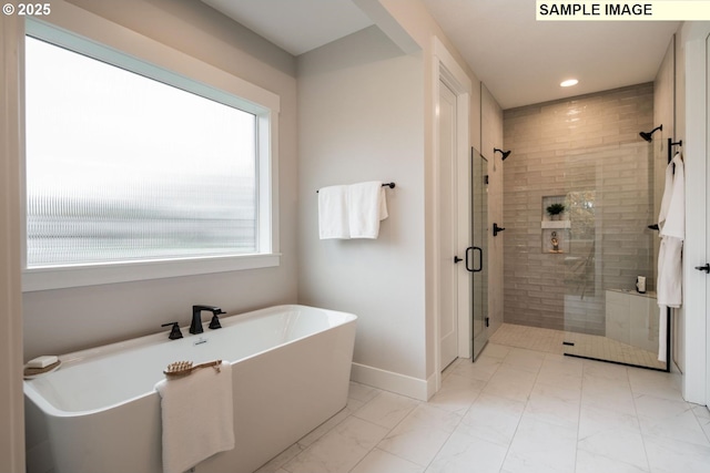 1205 S Mountain Pl, Ridgefield, WA 98642 - full bathroom with a freestanding tub, marble finish floor, recessed lighting, and a stall shower