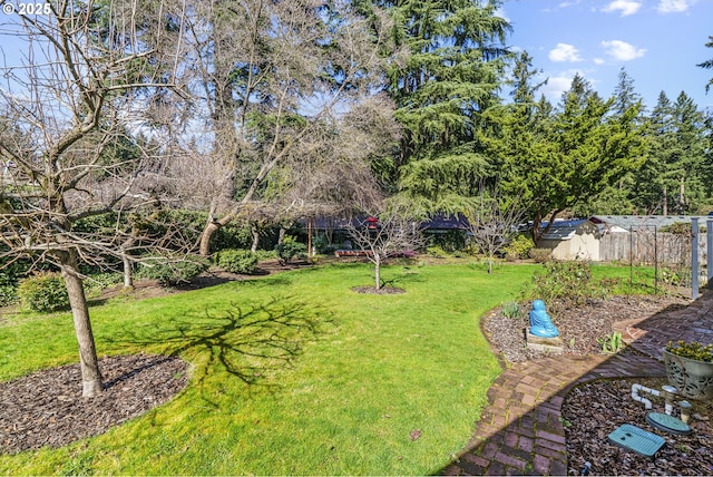 view of yard with fence