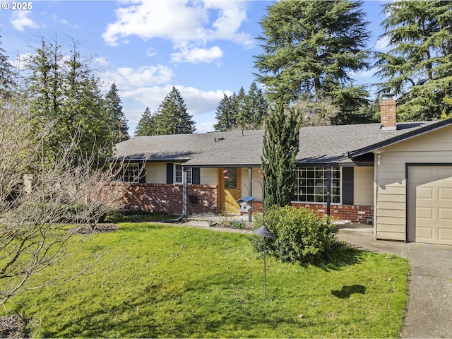 single story home featuring a front yard, a shingled roof, a chimney, a garage, and brick siding