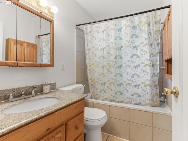 full bathroom with vanity, shower / tub combo, and toilet
