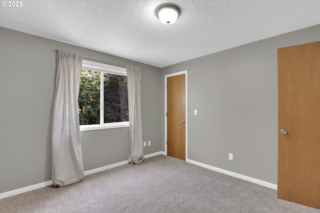 14011 NE 346th St, Battle Ground, WA 98604 - empty room featuring a textured ceiling and carpet