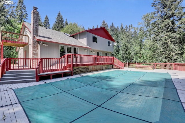 14011 NE 346th St, Battle Ground, WA 98604 - view of swimming pool featuring a deck, a covered pool, and stairway