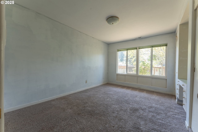 176 N Henry St, Coquille, OR 97423 - carpeted spare room with baseboards
