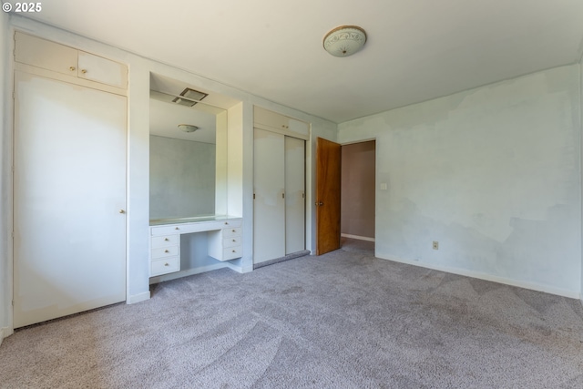 176 N Henry St, Coquille, OR 97423 - unfurnished bedroom featuring carpet floors, baseboards, and a closet