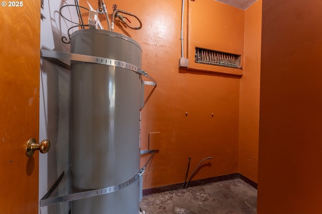 176 N Henry St, Coquille, OR 97423 - utility room with water heater