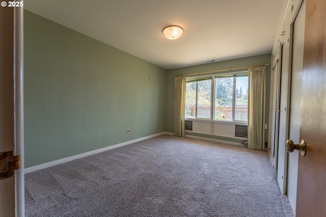 176 N Henry St, Coquille, OR 97423 - empty room with carpet flooring and baseboards