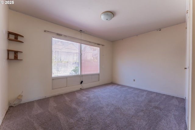 176 N Henry St, Coquille, OR 97423 - spare room featuring carpet floors and baseboards