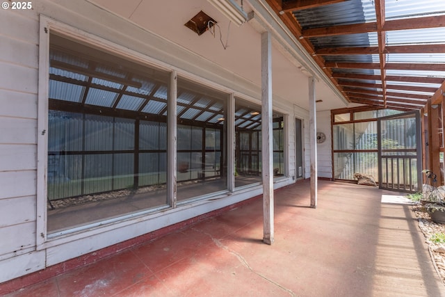 176 N Henry St, Coquille, OR 97423 - unfurnished sunroom featuring vaulted ceiling