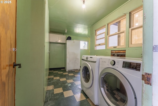 176 N Henry St, Coquille, OR 97423 - laundry room with dark flooring and washer and clothes dryer