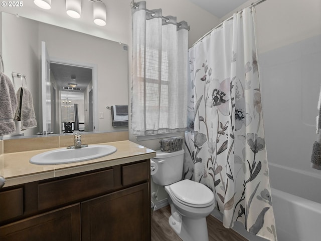 1053 Winfield St NE, Gervais, OR 97026 - bathroom featuring vanity, shower / bath combination with curtain, and wood finished floors