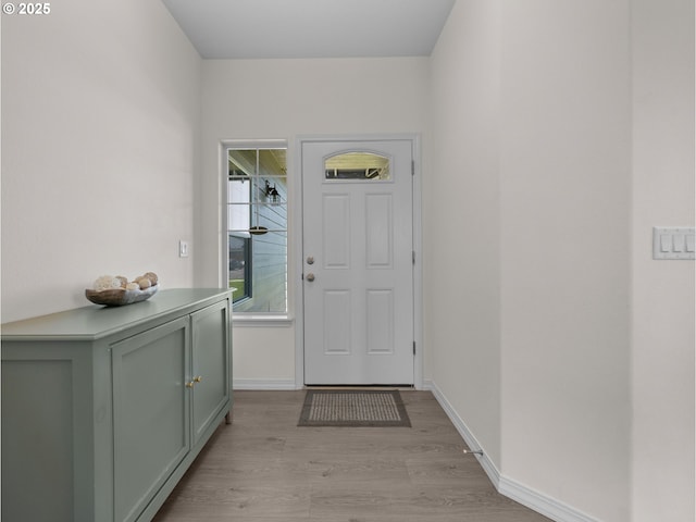 1053 Winfield St NE, Gervais, OR 97026 - doorway to outside with light wood-type flooring and baseboards