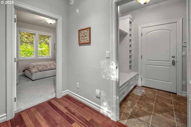 mudroom featuring baseboards