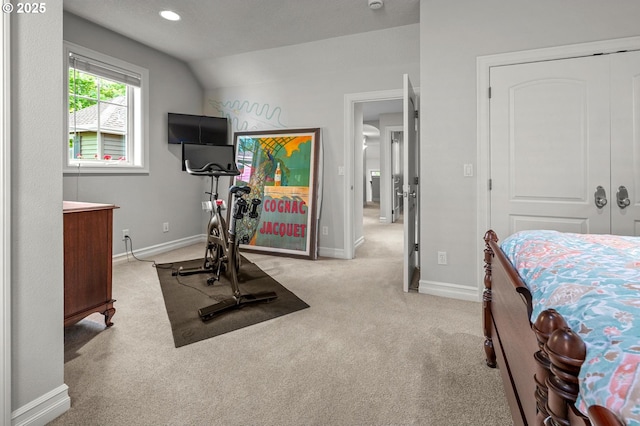 workout room with carpet floors, baseboards, vaulted ceiling, and recessed lighting