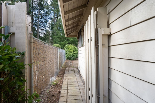 view of home's exterior featuring fence