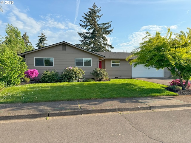 ranch-style home with an attached garage, crawl space, a front yard, and concrete driveway