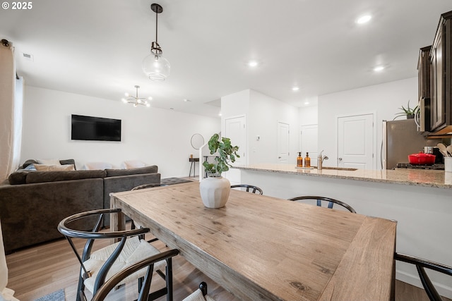 3563 SE Richey Rd, Gresham, OR 97080 - dining space with light wood-type flooring, recessed lighting, and a chandelier