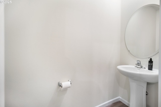 3563 SE Richey Rd, Gresham, OR 97080 - bathroom with baseboards, wood finished floors, and a sink