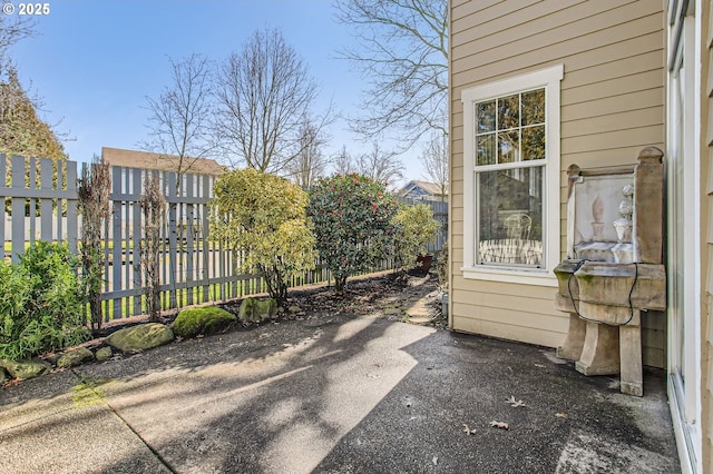 view of patio with fence