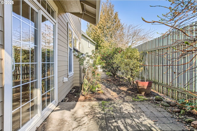 view of yard featuring a patio and fence