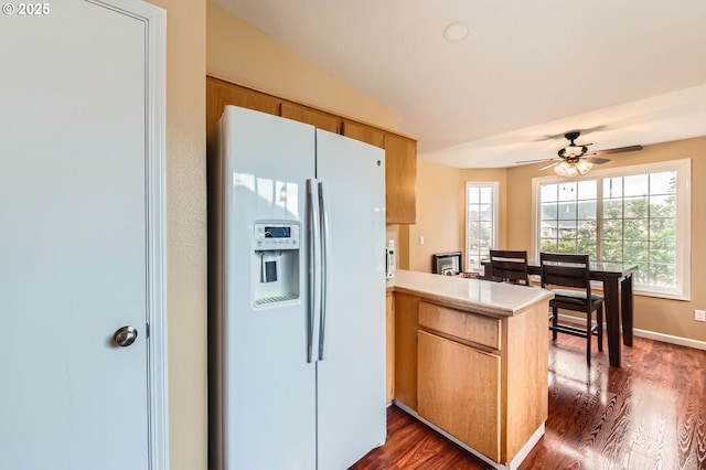 15619 NE Hickory St, Vancouver, WA 98682 - kitchen featuring white fridge with ice dispenser, a peninsula, dark wood finished floors, light countertops, and ceiling fan