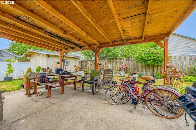 15619 NE Hickory St, Vancouver, WA 98682 - fenced backyard with a patio area and an outbuilding