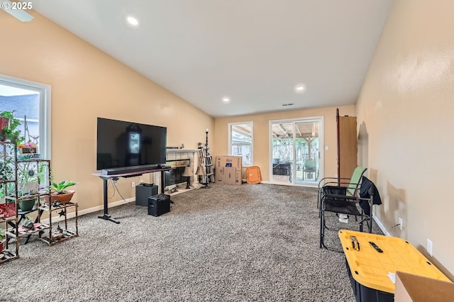 15619 NE Hickory St, Vancouver, WA 98682 - living room featuring carpet floors, a fireplace, vaulted ceiling, and recessed lighting