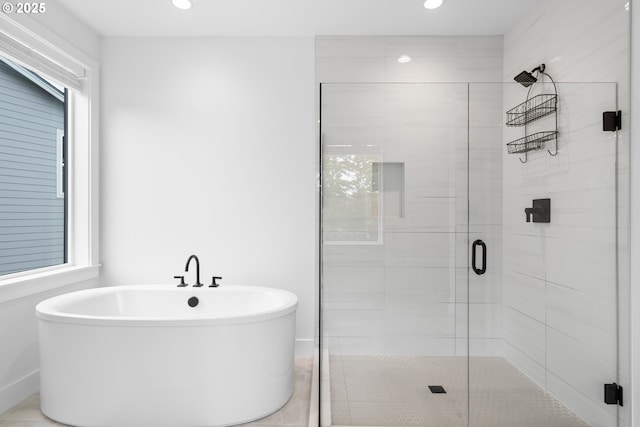 15625 NW Gooderham St, Portland, OR 97229 - full bathroom with a soaking tub, a shower stall, plenty of natural light, and recessed lighting