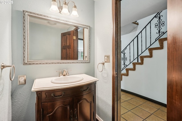 28040 SE Stark St, Troutdale, OR 97060 - bathroom featuring tile patterned flooring, a chandelier, and vanity