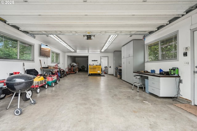 28040 SE Stark St, Troutdale, OR 97060 - garage featuring a garage door opener and a desk