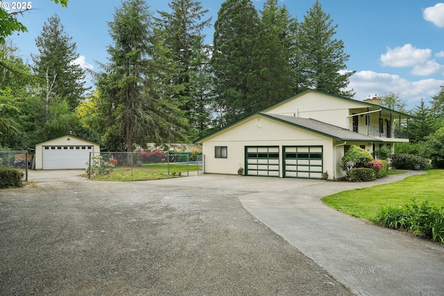 28040 SE Stark St, Troutdale, OR 97060 - view of side of property with a chimney, a garage, and view of scattered trees