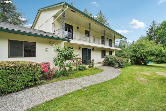 28040 SE Stark St, Troutdale, OR 97060 - rear view of house featuring a balcony, a lawn, french doors, and stucco siding