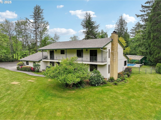 28040 SE Stark St, Troutdale, OR 97060 - view of front of home with a chimney, a balcony, and a shingled roof